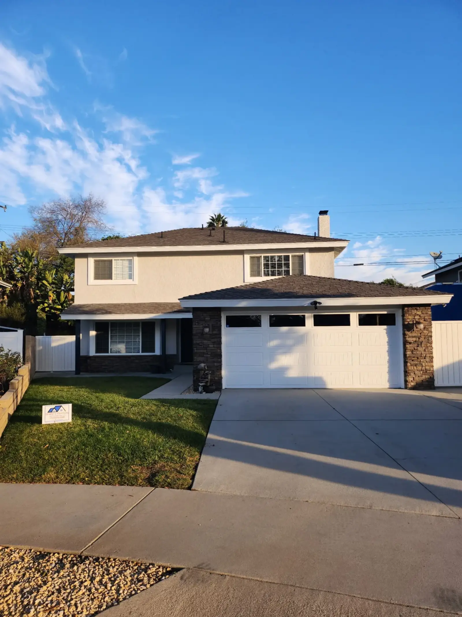 Evening view of a finished exterior in Orange County by Sharp's Painting