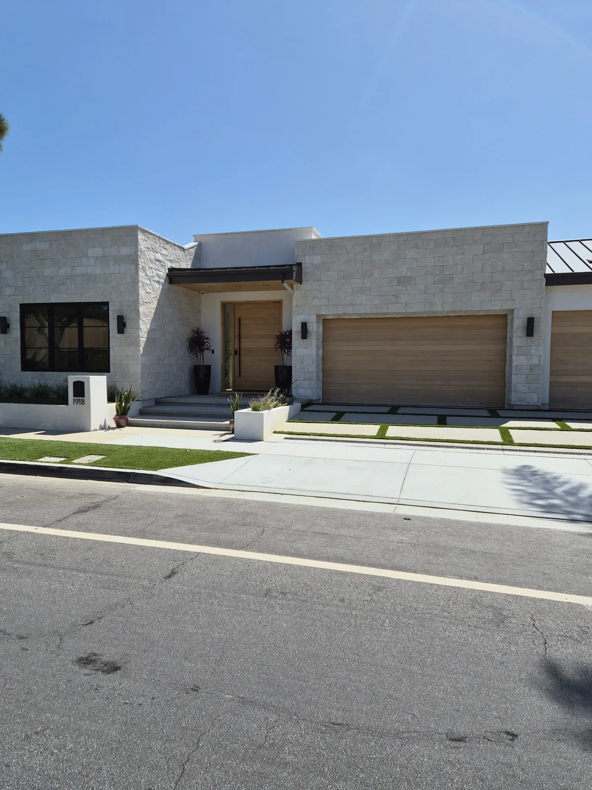 Stone and smooth stucco modern exterior in Orange County